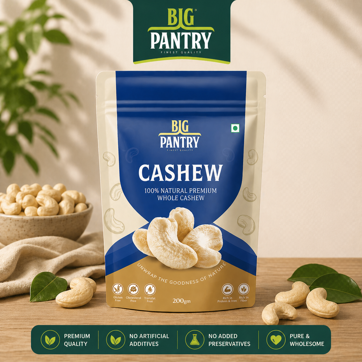 Big Pantry cashew nut packaging on a wooden surface with cashews and a plant in the background.